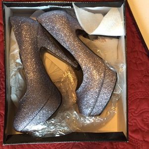 Never worn, in original box!